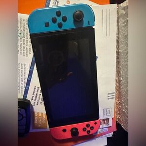 Nintendo switch, doc included. Selling because it’s hardly ever used